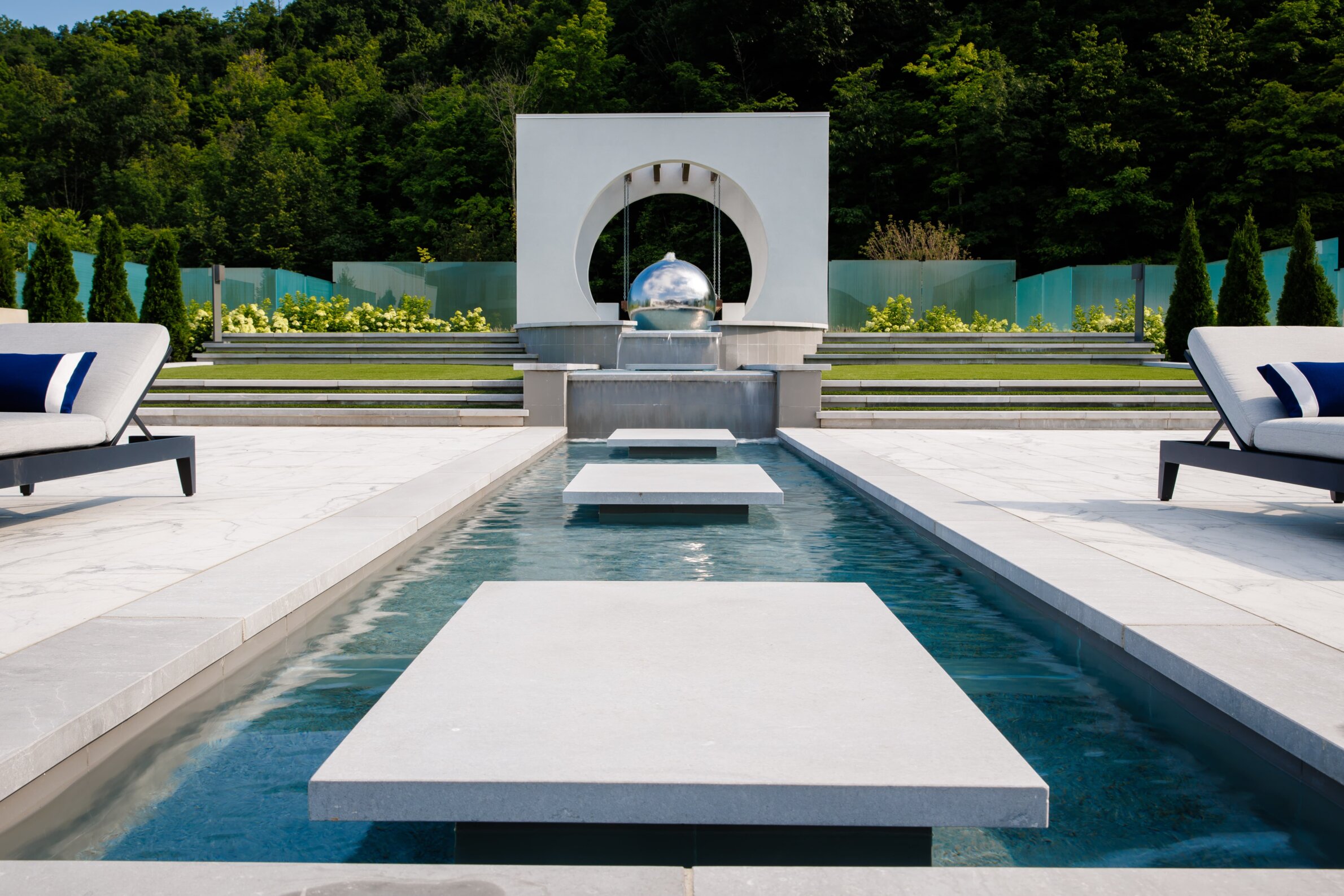 Pool installation with unique water features.